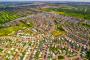 Overlooking houses and greenspace from above