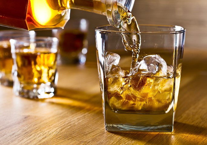 Alcohol being poured into glass